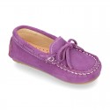 Suede leather Moccasin shoes with bows and driver type Outsole for little kids.