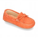 Suede leather Moccasin shoes with bows and driver type Outsole for little kids.