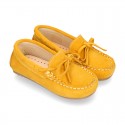 Suede leather Moccasin shoes with bows and driver type Outsole for little kids.