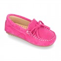 Suede leather Moccasin shoes with bows and driver type Outsole for little kids.