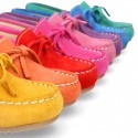 Suede leather Moccasin shoes with bows and driver type Outsole for little kids.