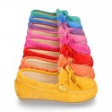 Suede leather Moccasin shoes with bows and driver type Outsole for little kids.