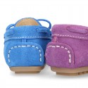 Suede leather Moccasin shoes with bows and driver type Outsole for little kids.