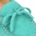 Suede leather Moccasin shoes with bows and driver type Outsole for little kids.