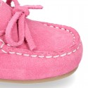 Suede leather Moccasin shoes with bows and driver type Outsole for little kids.