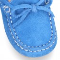 Suede leather Moccasin shoes with bows and driver type Outsole for little kids.