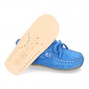 Suede leather Moccasin shoes with bows and driver type Outsole for little kids.