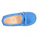 Suede leather Moccasin shoes with bows and driver type Outsole for little kids.