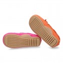 Suede leather Moccasin shoes with bows and driver type Outsole for little kids.