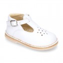 Nappa Leather kids T-strap shoes with buckle fastening and new perforated design.