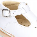 Nappa Leather kids T-strap shoes with buckle fastening and new perforated design.