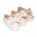 Metal canvas Bamba shoes with sweet BOW design.