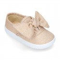 Metal canvas Bamba shoes with sweet BOW design.