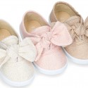 Metal canvas Bamba shoes with sweet BOW design.