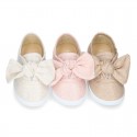 Metal canvas Bamba shoes with sweet BOW design.