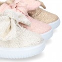 Metal canvas Bamba shoes with sweet BOW design.