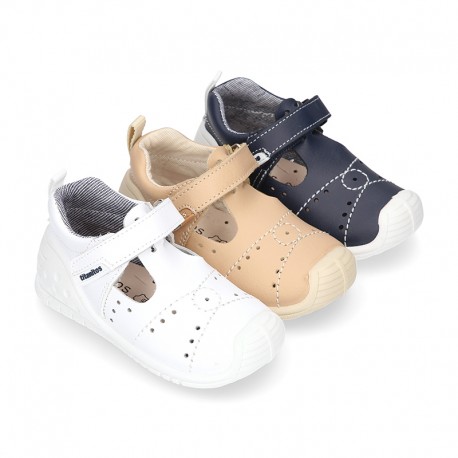 Washable leather little T-Strap shoes sandal style with hook and loop strap reinforced toe cap and counter for first steps.