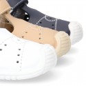 Washable leather little T-Strap shoes sandal style with hook and loop strap reinforced toe cap and counter for first steps.