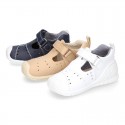 Washable leather little T-Strap shoes sandal style with hook and loop strap reinforced toe cap and counter for first steps.