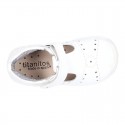 Washable leather little T-Strap shoes sandal style with hook and loop strap reinforced toe cap and counter for first steps.