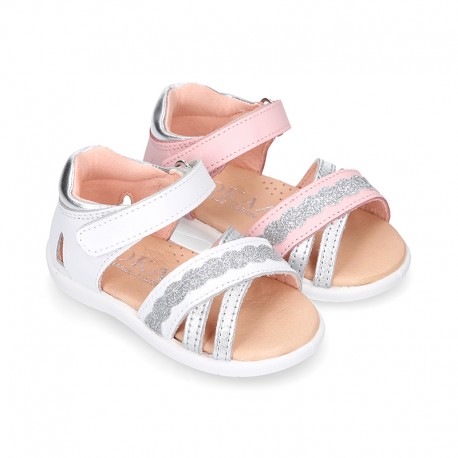 Little Washable leather Sandal shoes with crossed straps and hook and loop closure.