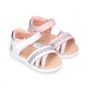 Little Washable leather Sandal shoes with crossed straps and hook and loop closure.