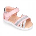 Little Washable leather Sandal shoes with crossed straps and hook and loop closure.