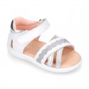 Little Washable leather Sandal shoes with crossed straps and hook and loop closure.