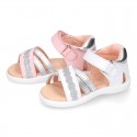 Little Washable leather Sandal shoes with crossed straps and hook and loop closure.