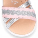 Little Washable leather Sandal shoes with crossed straps and hook and loop closure.