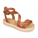 Cowhide leather sandal shoes espadrille style with braided design and buckle closure to the ankle.
