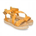 Cowhide leather sandal shoes espadrille style with braided design and buckle closure to the ankle.