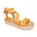 Cowhide leather sandal shoes espadrille style with braided design and buckle closure to the ankle.