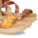 Cowhide leather sandal shoes espadrille style with braided design and buckle closure to the ankle.