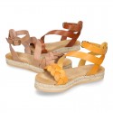 Cowhide leather sandal shoes espadrille style with braided design and buckle closure to the ankle.