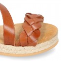 Cowhide leather sandal shoes espadrille style with braided design and buckle closure to the ankle.