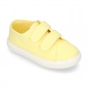 Cotton Canvas kids Sneaker laceless in LEMON color.