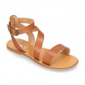 Cowhide leather girl sandal shoes and with buckle closure to the ankle.