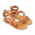 Cowhide leather girl sandal shoes and with buckle closure to the ankle.