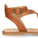 Cowhide leather girl sandal shoes and with buckle closure to the ankle.