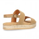 Cowhide leather sandal shoes espadrille style with braided design and buckle closure to the ankle.