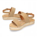 Cowhide leather sandal shoes espadrille style with braided design and buckle closure to the ankle.