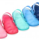 Kids jelly shoes with SURFI CLOG design for beach and pool use.