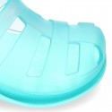 Kids jelly shoes with SURFI CLOG design for beach and pool use.