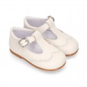 Nappa leather Little Classic T-Strap style shoes with perforated design.