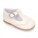 Nappa leather Little Classic T-Strap style shoes with perforated design.