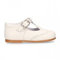 Nappa leather Little Classic T-Strap style shoes with perforated design.