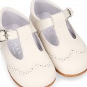 Nappa leather Little Classic T-Strap style shoes with perforated design.