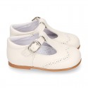 Nappa leather Little Classic T-Strap style shoes with perforated design.