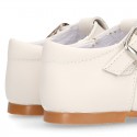 Nappa leather Little Classic T-Strap style shoes with perforated design.